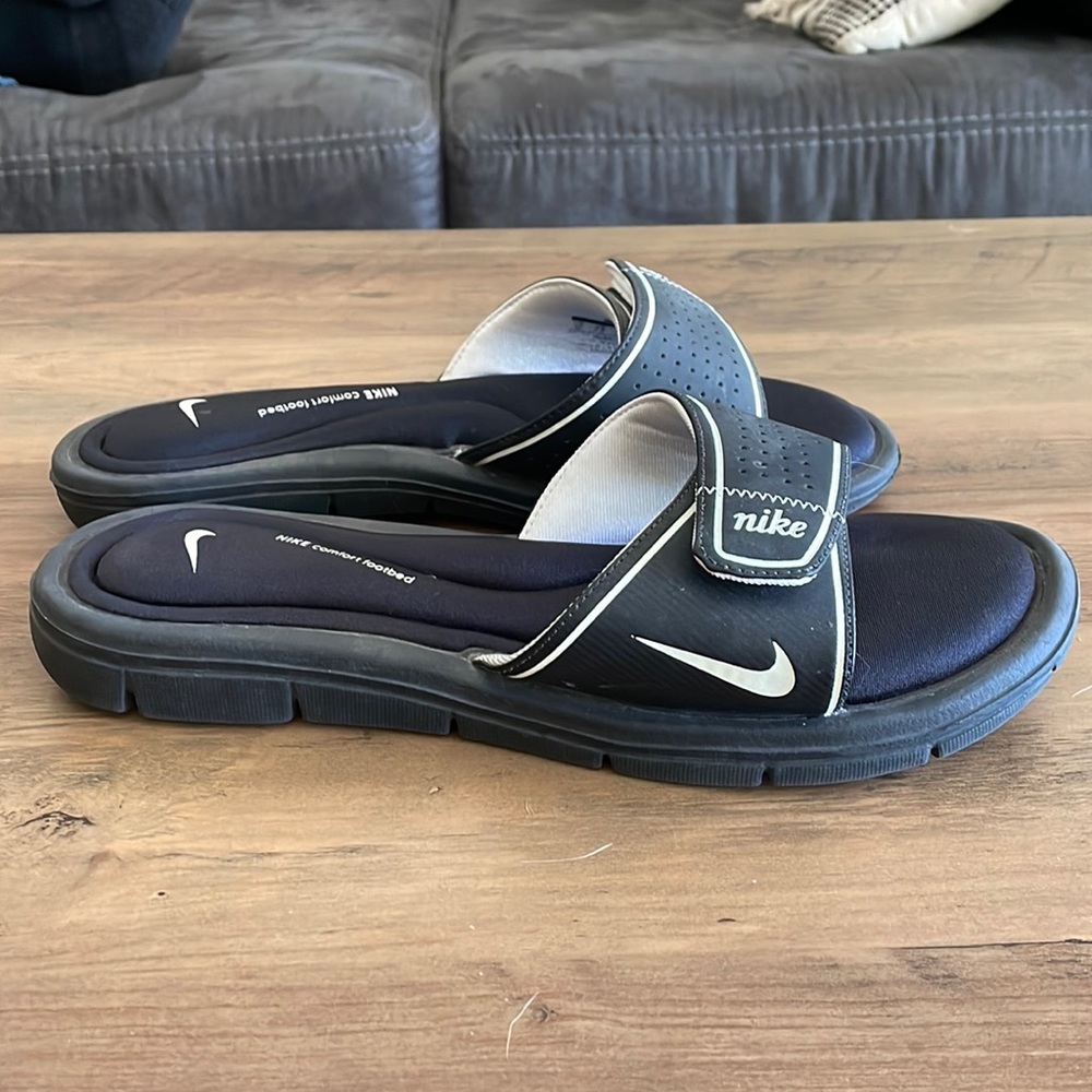 Nike slip on flats. Super comfortable foam bottom.